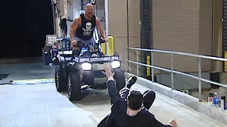 “Stone Cold” Steve Austin chases Mr. McMahon on an ATV