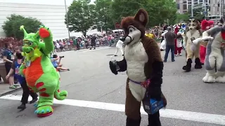 Anthrocon 2022 18 Fursuit Parade - Felix Fox again, and Pheagle the Bald Eagle