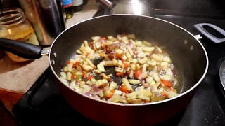 What's For Dinner? Quick Delicious Meal. Venison burger, potatoes, onions, peppers and potatoes.