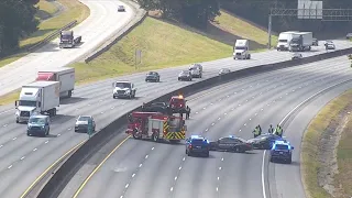 Truck driver found shot to death on I-285 WB