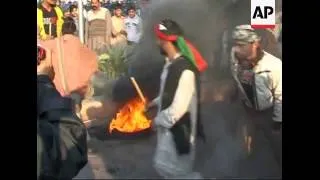 Thousands take to the streets to protest Bhutto killing