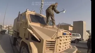 US Marine destroying an MRAP at Kabul Airport Afghanistan