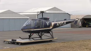 Enstrom 480b takes off from cart