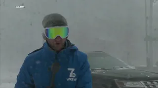 Seattle car slides down icy hill, hitting parked vehicles