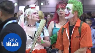 Costumed fans dress as favourite superheroes at Comic Con London