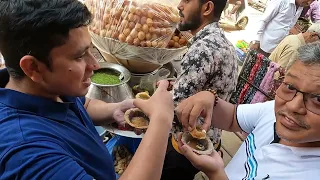 Filipinos trying the Pani Puri in Bangalore, India
