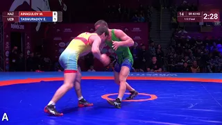 1/2 GR - 63 kg: M. AINAGULOV (KAZ) v. E. TASMURADOV (UZB)