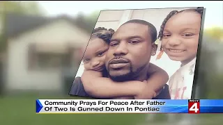 Community prays for peace after father of two gunned down in Pontiac