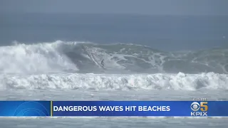 Powerful Surf Strikes Coast; Surfers At Ocean Beach Brave Dangerous Waves