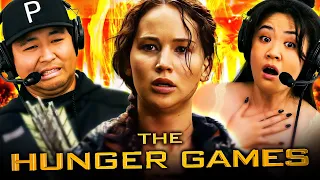 First time watching THE HUNGER GAMES (2012) blind movie reaction!