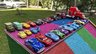 Disney Pixar Cars Fall Into The Water  Lightning McQueen Sally Mater Sheriff Red Fillmore Sarge Mack