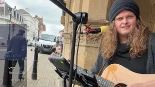 English Busker performing for change