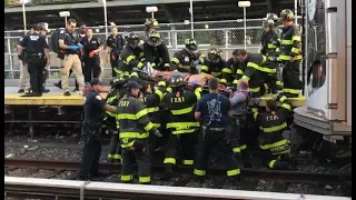 FDNY Firefighters Rescue Man Under Train / Brooklyn NYC 2017