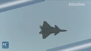 J-20 stealth fighter jets take to the sky at Airshow China