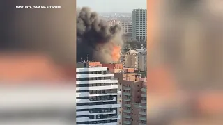 Fire rips through high-rise in Spain