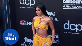 Cardi B & Offset kiss for the 2019 Billboard Music Awards