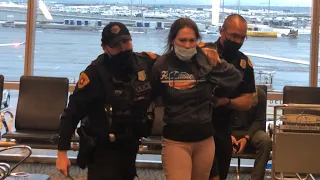 Woman accused of kicking officer during SLC Airport meltdown