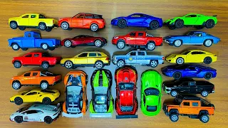 A Box With Different Toy Cars Inside