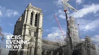 New Notre Dame spire being installed