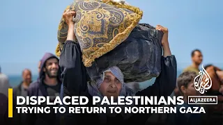 Thousands of displaced Palestinians try to return to homes in north Gaza