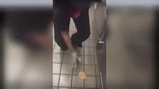 Watch a Checkers Worker Serve a Burger Bun After Wiping it on Floor