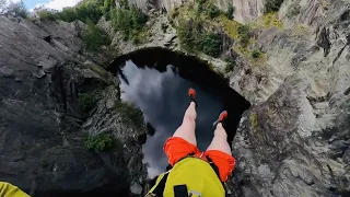 Base Jumper Does Front Flip Off Abandoned Quarry