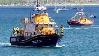 RNLI Weymouth Lifeboat Station celebrates 150 years. Parade of Boats. Nothe Fort guns.