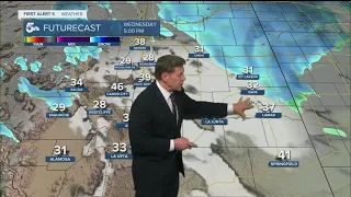 Windy & cooler Wednesday, with a few flurries possible