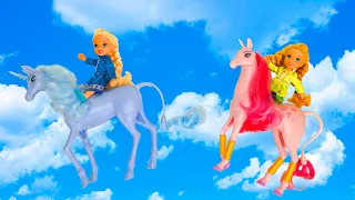 Elsa and Anna toddlers fly to the magic fairy land with their unicorns