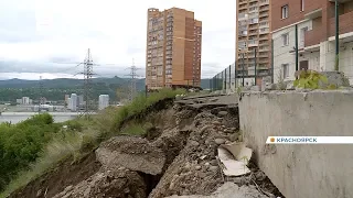 В Красноярске жители многоэтажки у обрыва боятся, что дом сползет по склону