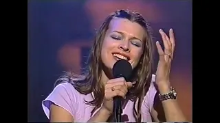 Milla Jovovich singing "Gentleman Who Fell" in Late Night Show in 1994