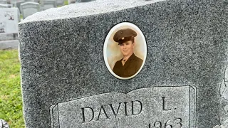 This Marine and his wife were looking on as we cleaned his military marker.