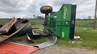 Tour tornado damage on farm near Webberville, Michigan