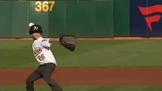 Santa Rosa fire survivor throws first pitch at Oakland A's game