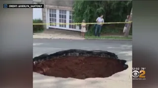 Sinkhole Swallows Pavement On New Jersey Street