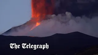 Mount Etna violently erupts after weeks of calm, spewing lava into the sky