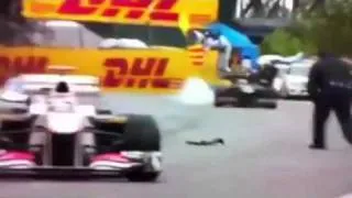 F1 funny- track marshall falls in front of F1 cars- Canadia