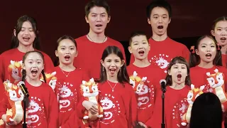 A powerful children's chorus performance titled "Descendants of the Dragon "