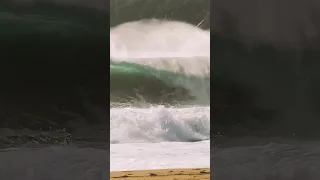 Sage Burke surfing a HUGE Wave