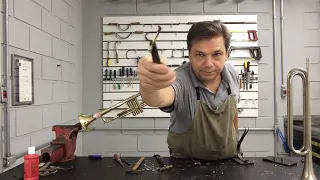 Como destravar tubo de bomba de afinação de trompete