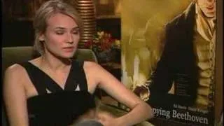 DIANE KRUGER CONDUCTS AN ORCHESTRA