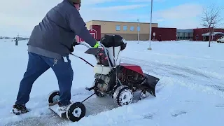 Frankenplow,  walk behind snowplow with sulky cart.