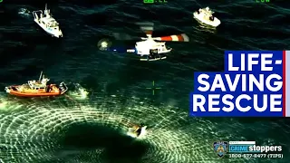 Video: Amazing rescue of woman from capsized boat