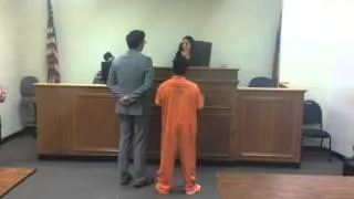 Video: Suspect charged with murder of sheriff's clerk appears in court