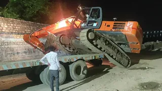 TATA Hitachi excavator loading Trailer