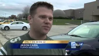 Community showing support for fired wrestling coach