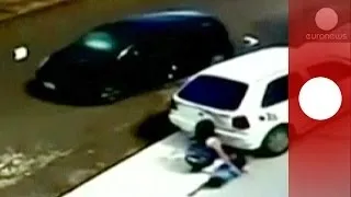 Shocking CCTV: Miracle escape for kid and grandmother run over by car