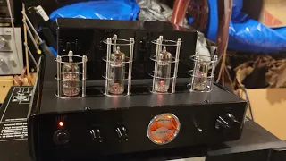 Technics SL-1800 Turntable paired with a Monoprice IIIP Tube amp driving a pair of Boston HD7