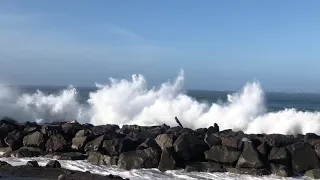 Lady gets smacked by wave during King Tide in Washington State