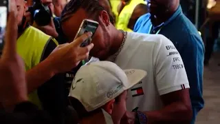 Tom meeting the king of F1, Lewis Hamilton